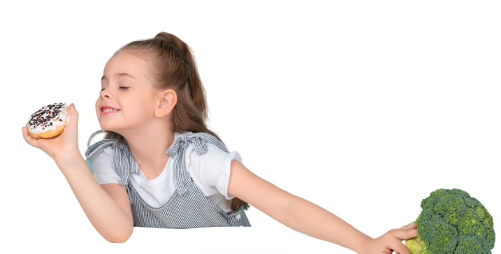 Parent and child sitting at dinner table, struggling with picky eating